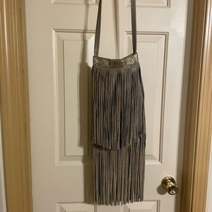 Calleen Cordero Fringe Purse in Stone. 21” long crossbody strap.